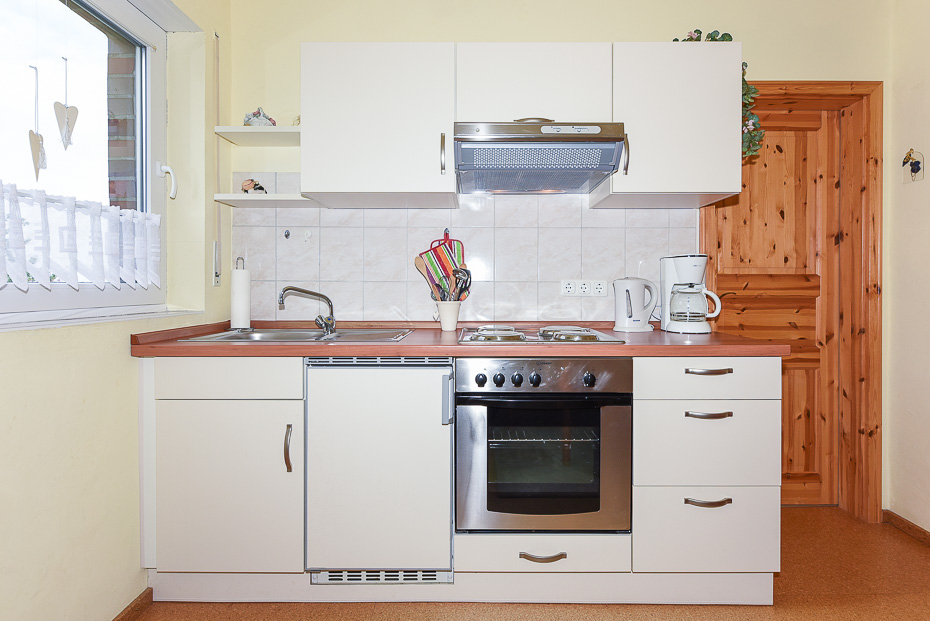 Ferienwohnung „Helgoland“ - Wohnzimmer mit integriertem Küchenbereich