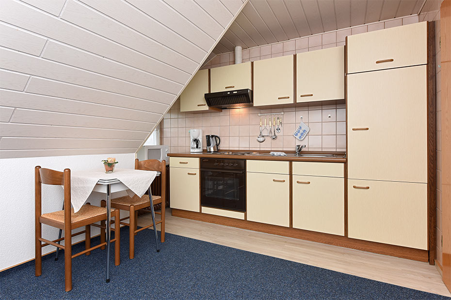 Ferienwohnung „Wangerooge“ - Wohnzimmer mit integriertem Küchenbereich