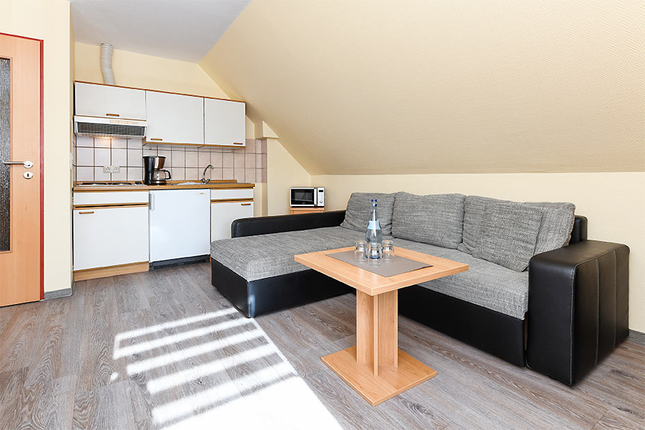 Apartment „Sylt“ - Wohnraum mit integrierter Küche