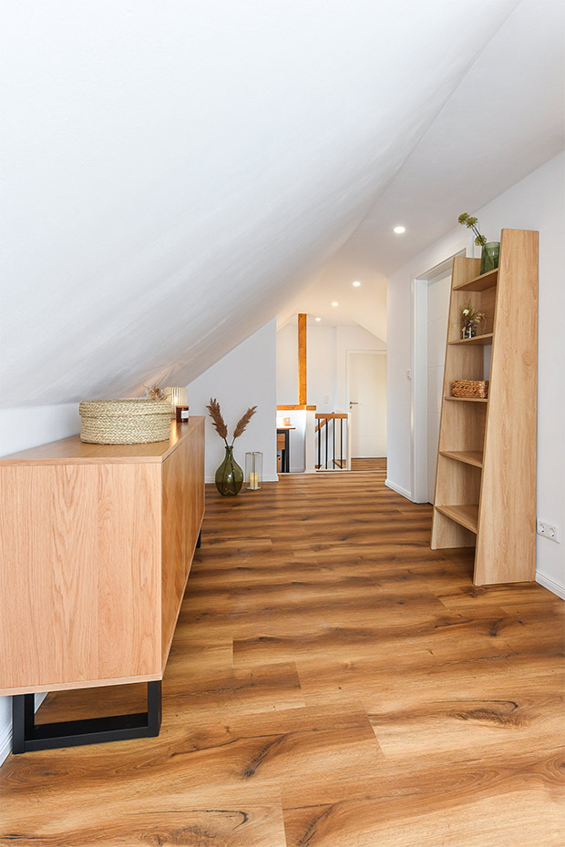 Ferienhaus „Friesenkrone“ - Diele/Treppe/Relaxecke