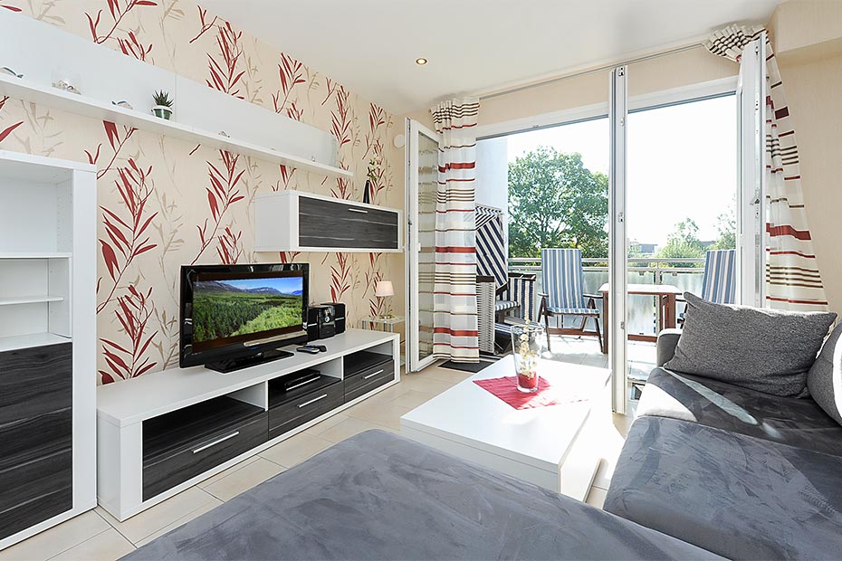 Ferienwohnung „Westerdam“ - Wohnzimmer mit integriertem Küchenbereich