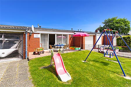 Ferienhaus „Weiße Robbe“ - Das Haus und der Garten