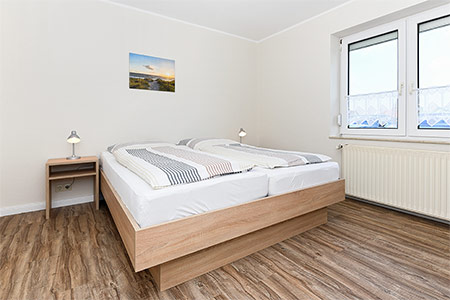 Ferienwohnung „Sanddorn“ - Schlafzimmer 1