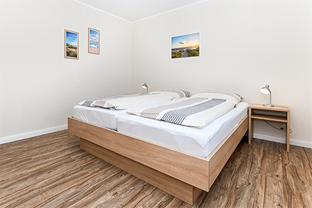 Ferienwohnung „Sanddorn“ - Schlafzimmer 1
