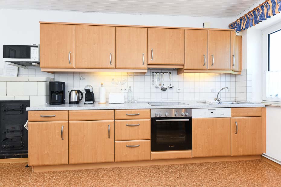 Ferienwohnung „Dünenblick“ - Wohnzimmer mit integriertem Küchenbereich