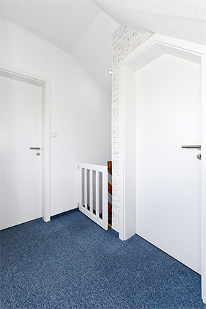 Ferienhaus „Dünenperle“ - Flur im Obergeschoss