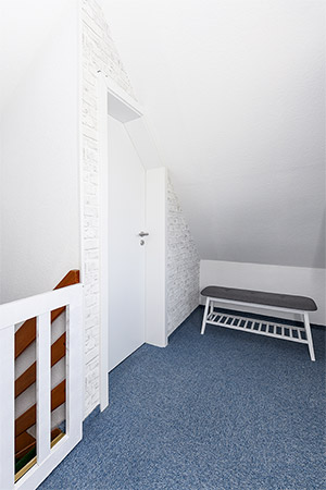 Ferienhaus „Dünenperle“ - Flur im Obergeschoss