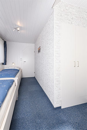 Ferienhaus „Dünenperle“ - Schlafzimmer 2/Kinderzimmer