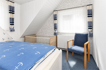 Ferienhaus „Dünenperle“ - Schlafzimmer 1