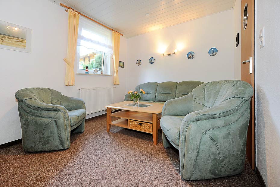 Ferienhaus „Dünenperle“ - Wohnzimmer