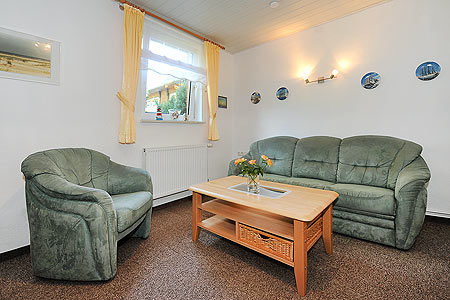 Ferienhaus „Dünenperle“ - Wohnzimmer