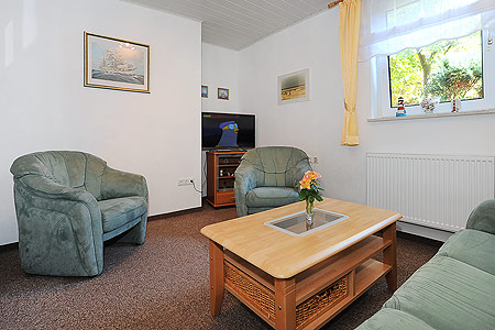 Ferienhaus „Dünenperle“ - Wohnzimmer