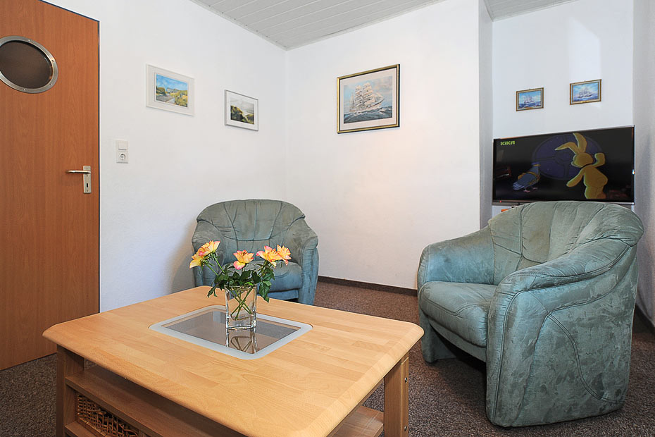 Ferienhaus „Dünenperle“ - Wohnzimmer