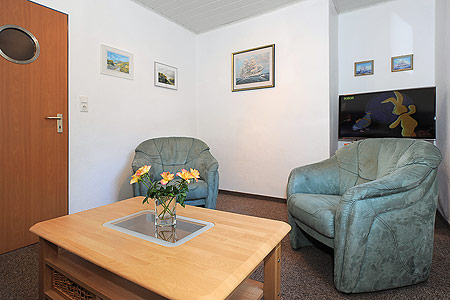 Ferienhaus „Dünenperle“ - Wohnzimmer