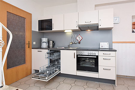 Ferienwohnung „Taddigsmöwe“ - Wohnraum mit integrierter Küche