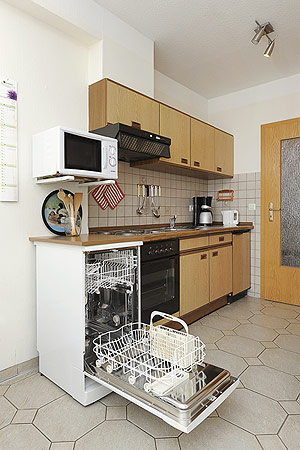 Ferienwohnung „Taddigsrobbe“ - Wohnraum mit integrierter Küche