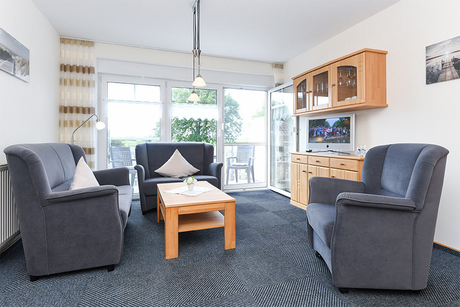 Ferienwohnung 1 - Wohnzimmer mit integriertem Küchenbereich