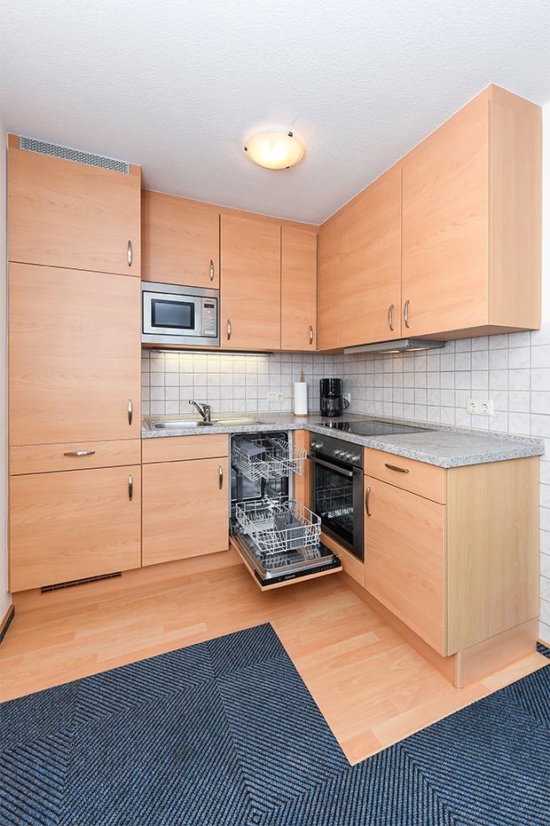 Ferienwohnung 1 - Wohnzimmer mit integriertem Küchenbereich