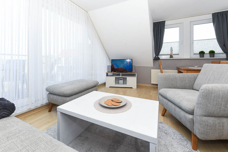 Ferienwohnung „Inselblick“ - Wohnzimmer mit integriertem Küchenbereich