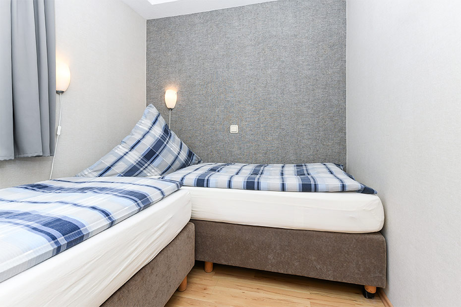 Ferienwohnung „Wattwurm“ - Schlafzimmer 2/Kinderzimmer