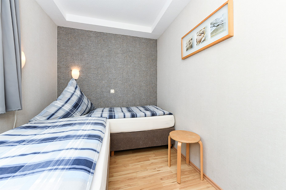 Ferienwohnung „Wattwurm“ - Schlafzimmer 2/Kinderzimmer