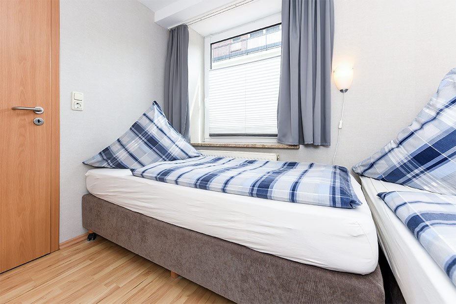 Ferienwohnung „Wattwurm“ - Schlafzimmer 2/Kinderzimmer