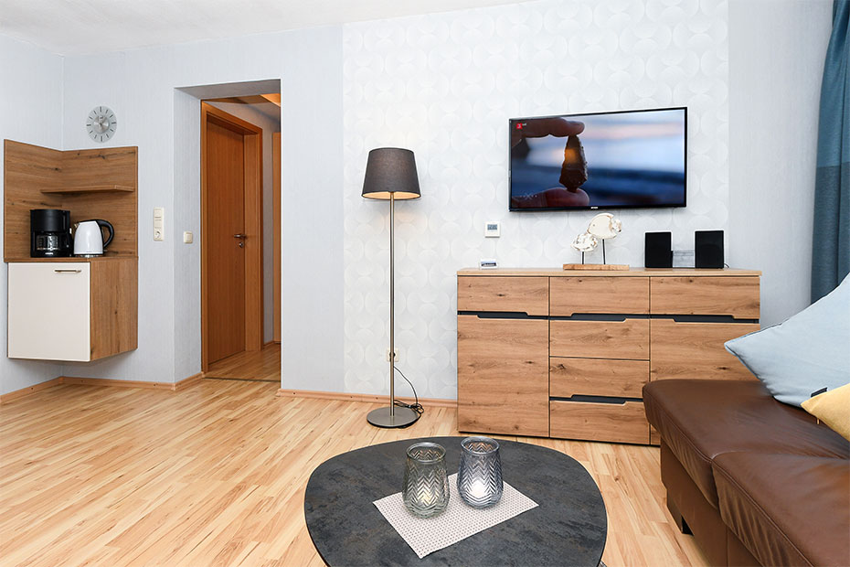 Ferienwohnung „Wattwurm“ - Wohnraum mit integrierter Küche