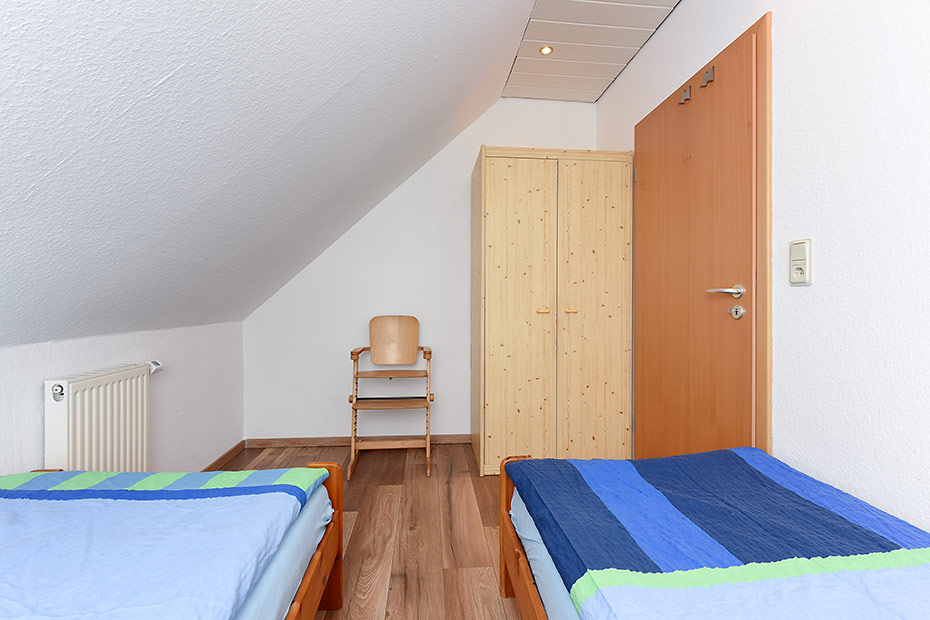 Ferienwohnung „Wattgeflüster“ - Schlafzimmer 2/Kinderzimmer